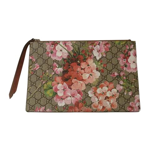 gucci blooms clutch|gucci supreme clutch.